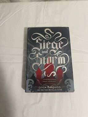 Leigh Bardugo Siege and Storm Hardcover Book - Red & Black Cover